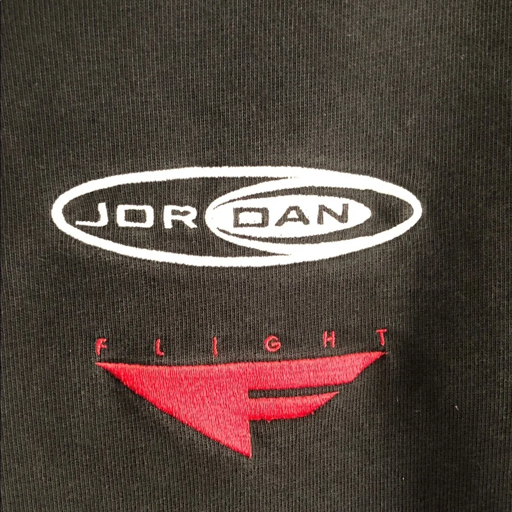 Jordan Black Long-Sleeve Polo with White Collar and Red Logos